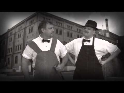 Black-and-white scene from the Corbett Cooling heritage commercial
